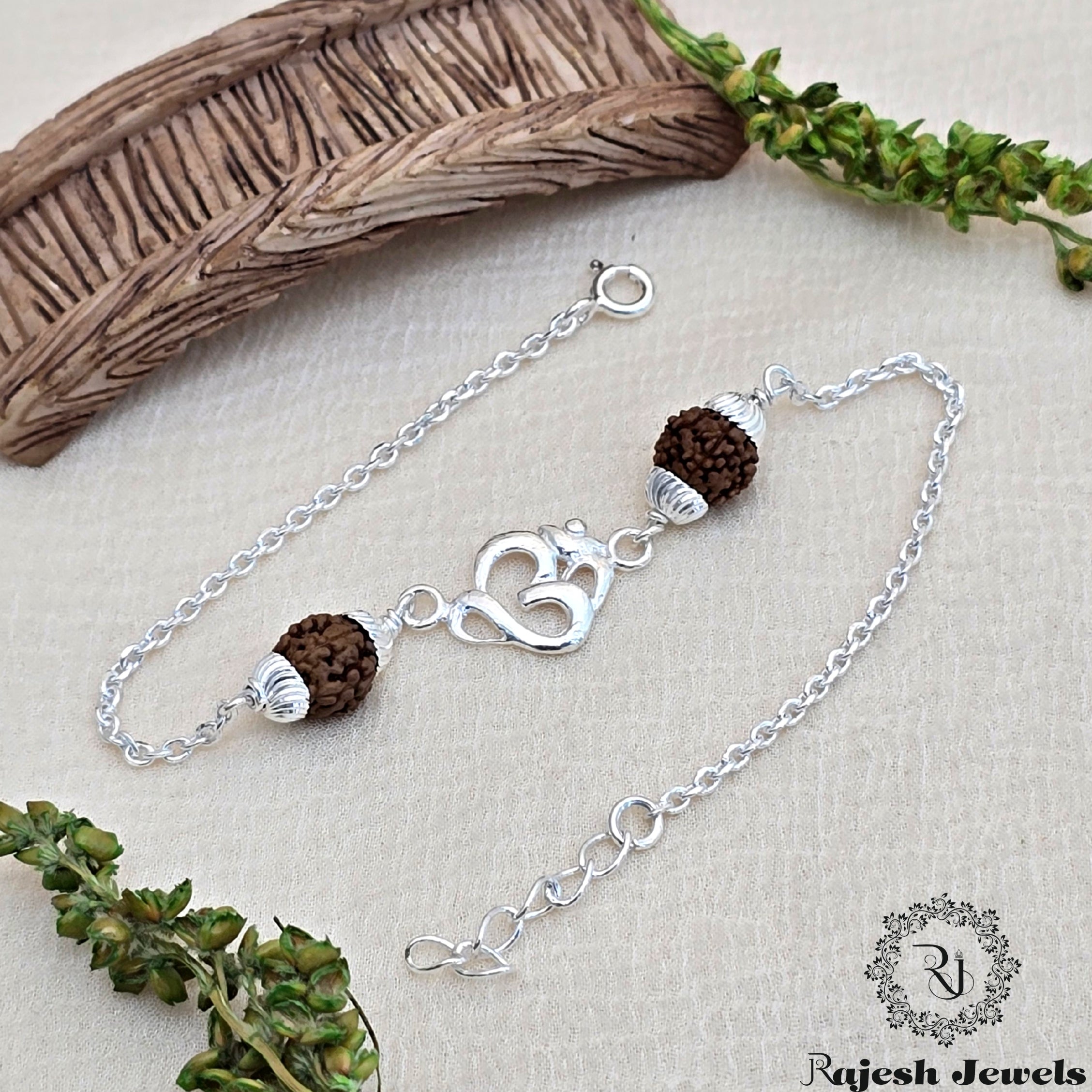 Rudraksh Om Silver Rakhi
