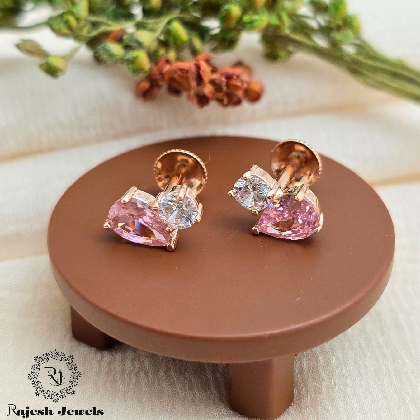 Dazzling Cz Rosegold South Screw Stud Earrings