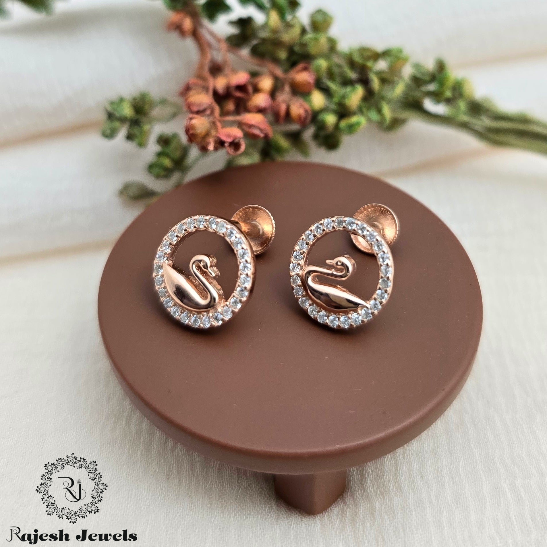 Lavish Swan Cz South Screw Stud Earrings