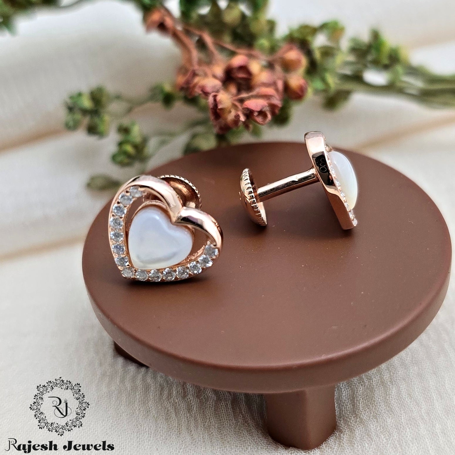 Heart-Warming Rosegold Cz South Screw Studs
