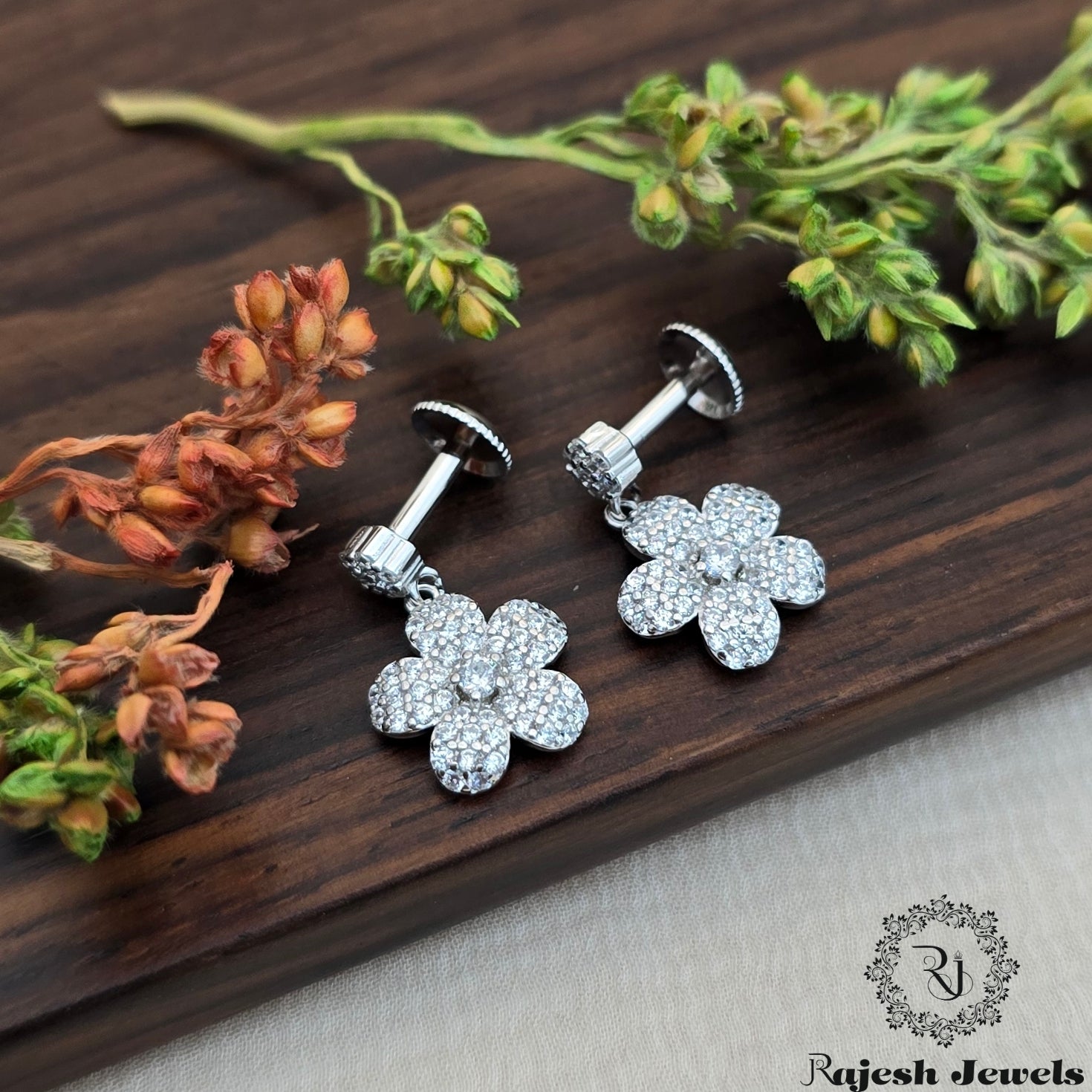 Mesmerizing Floral Cz South Screw Earrings
