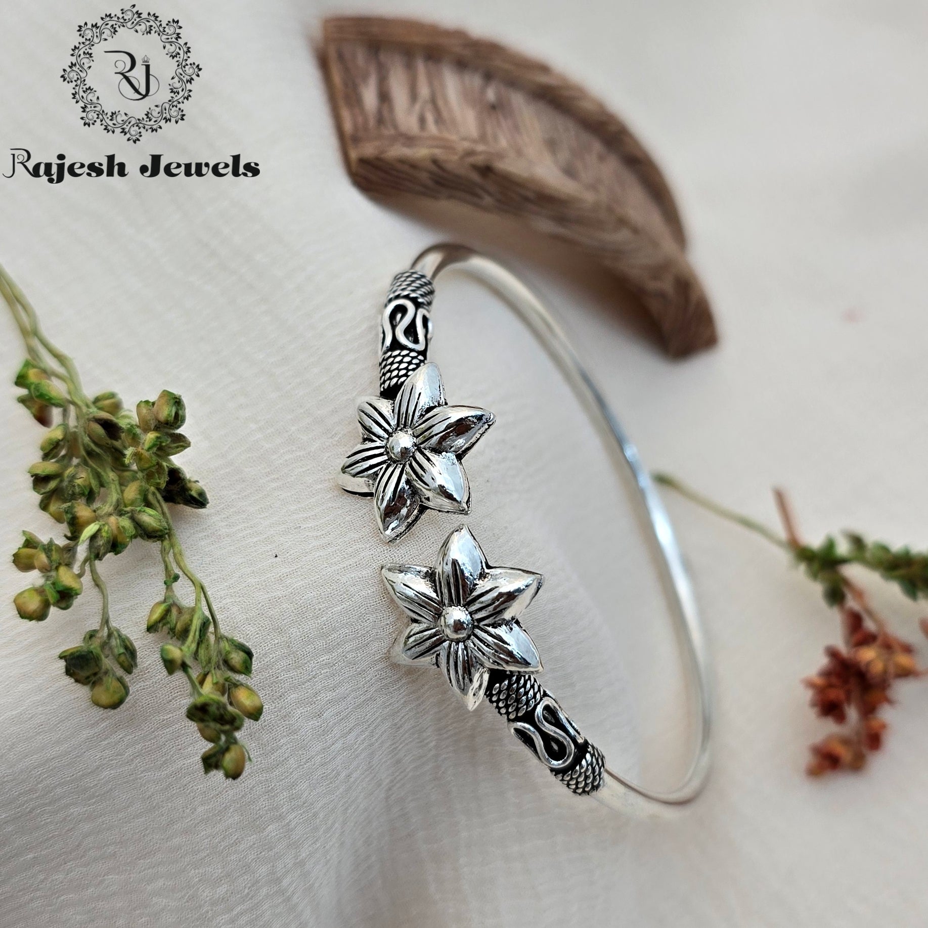 Mesmerizing Floral Oxidised Hand Kada