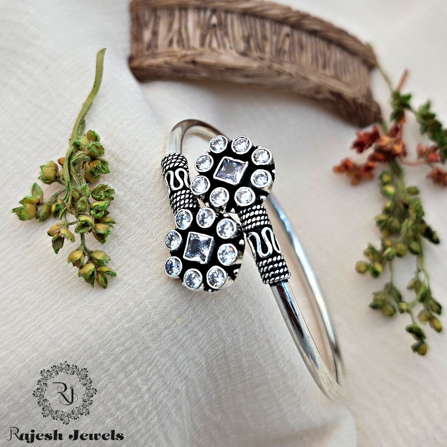 Shimmering Silver Cutstone Hand Kada