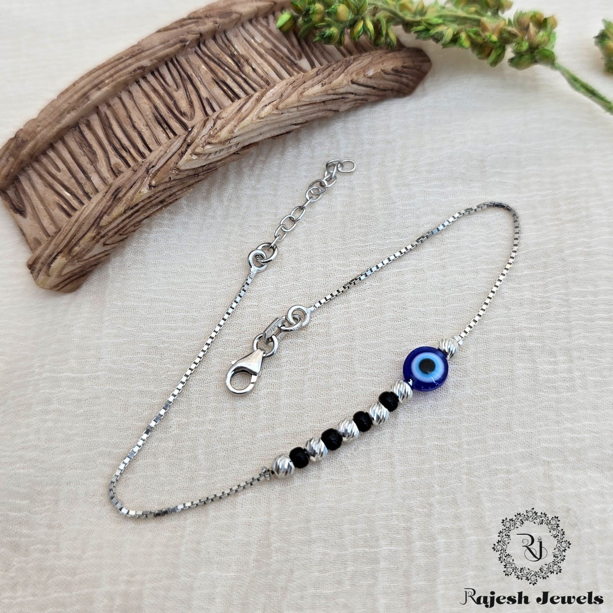 Sleek Evil-eye Silver Ladies Bracelet