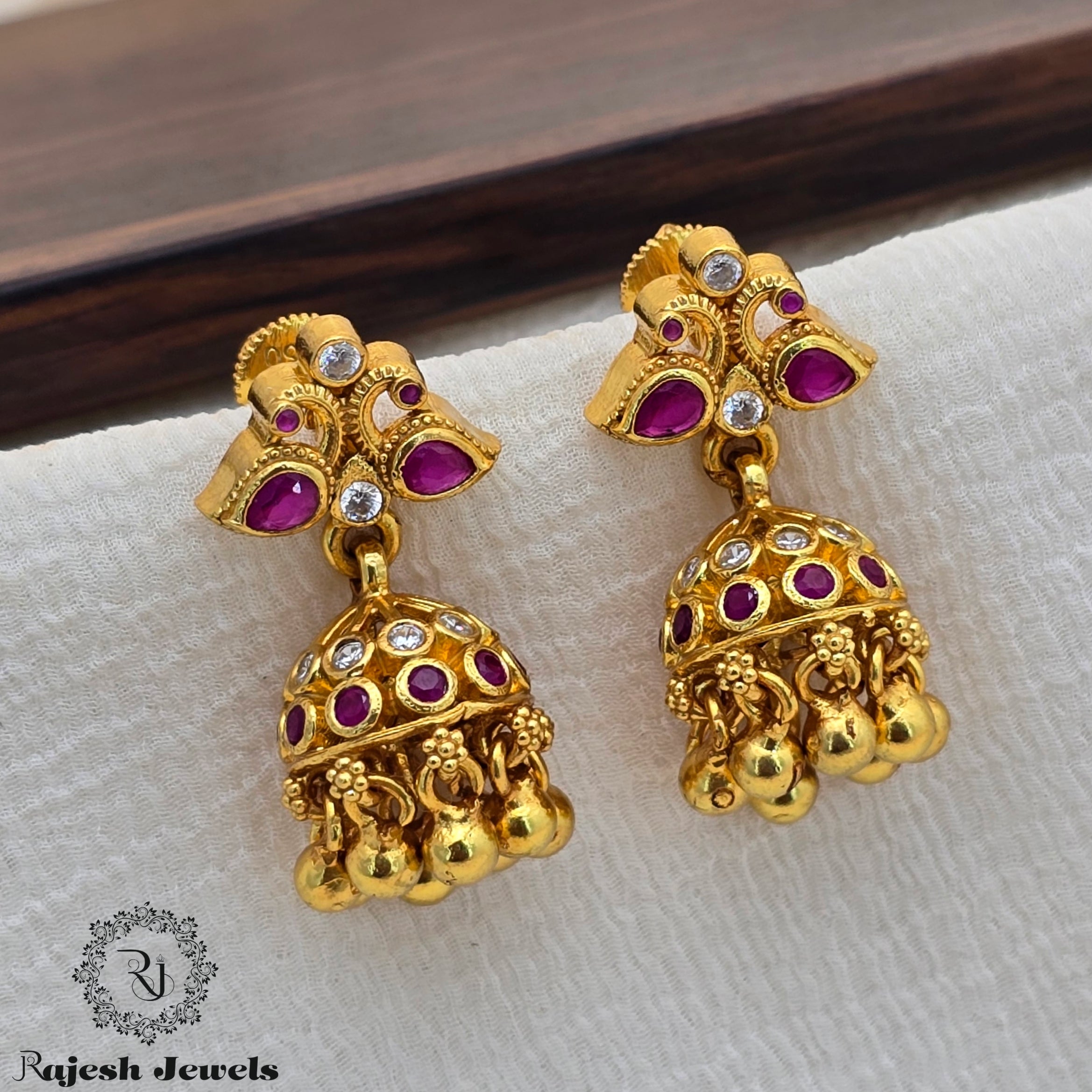 Beautiful Peacock Gold Plated Jhumka Earrings