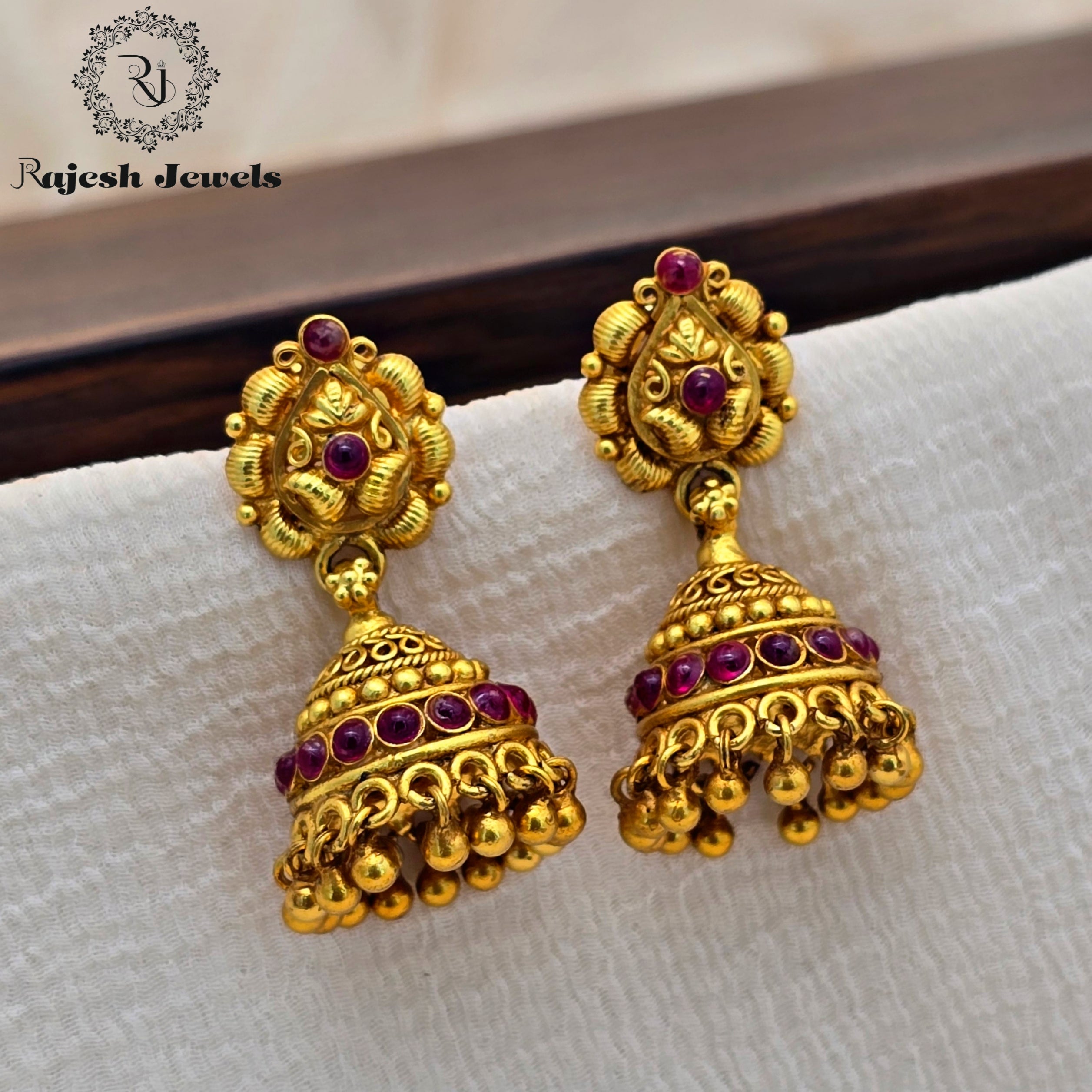 Alluring Kemp Gold Plated Jhumka Earrings