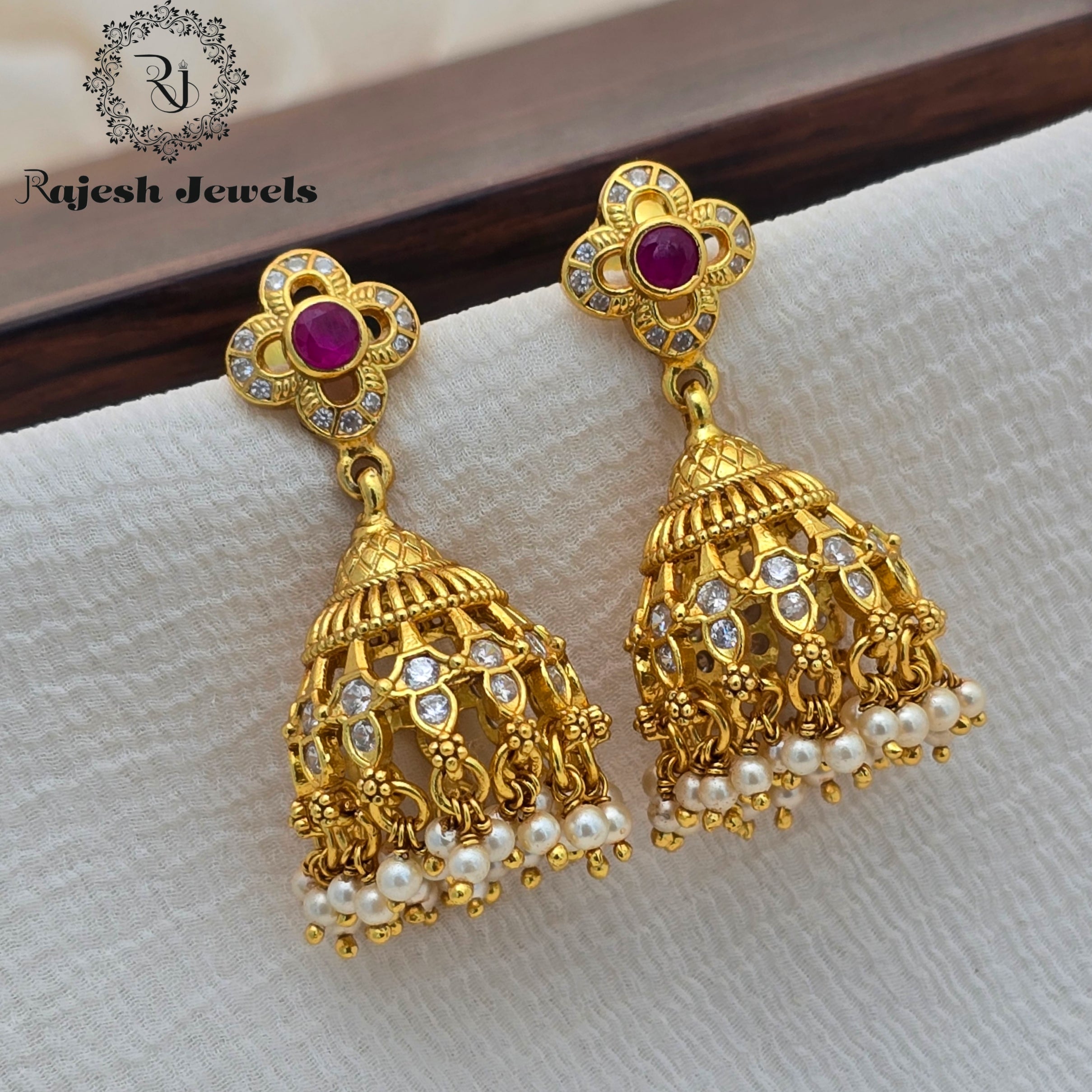 Fabulent Silver Gold Plated Jumka Earrings