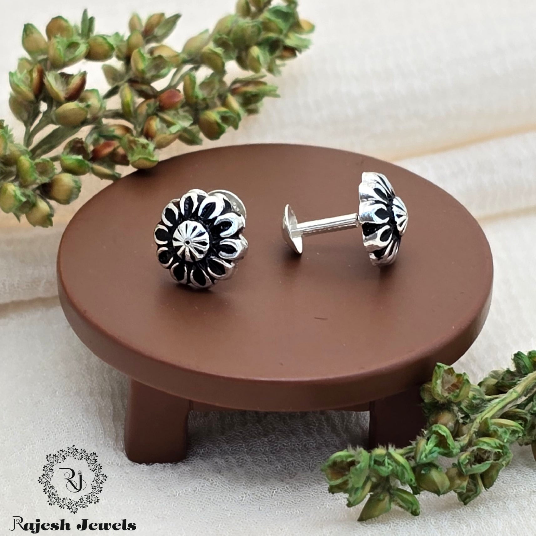 Conventional Silver Stud Earrings