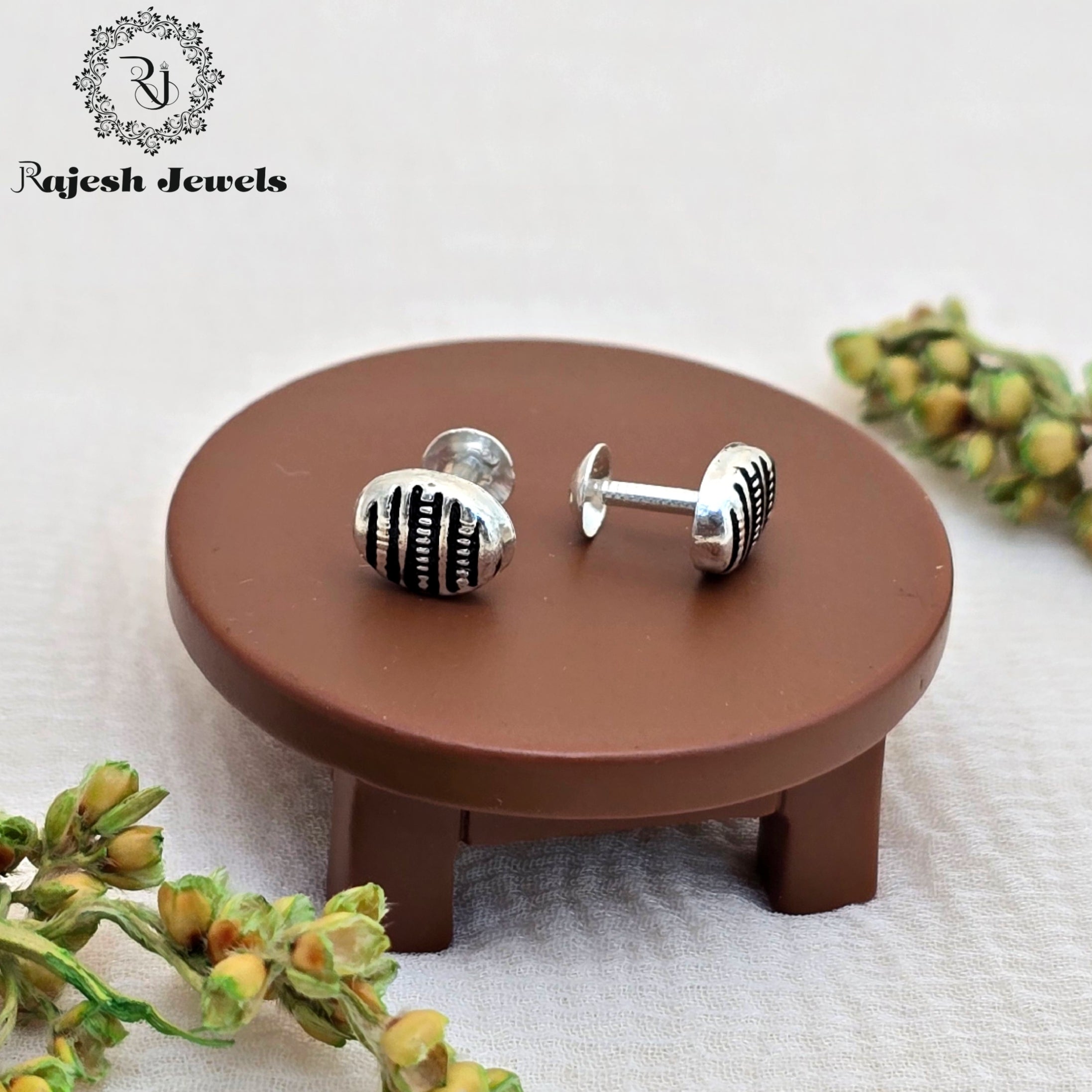 Intricate Silver Stud Earrings