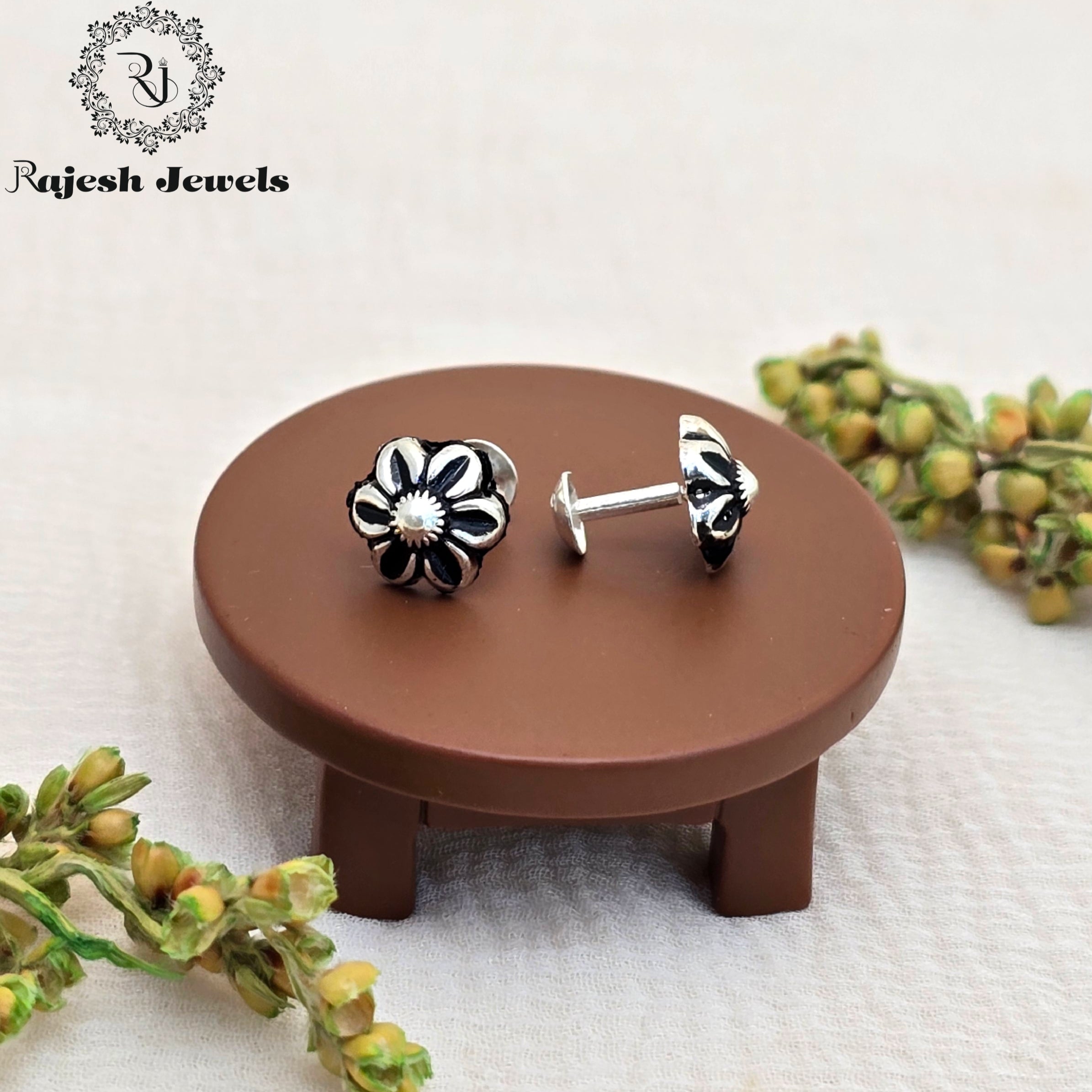 Charismatic Silver Stud Earrings