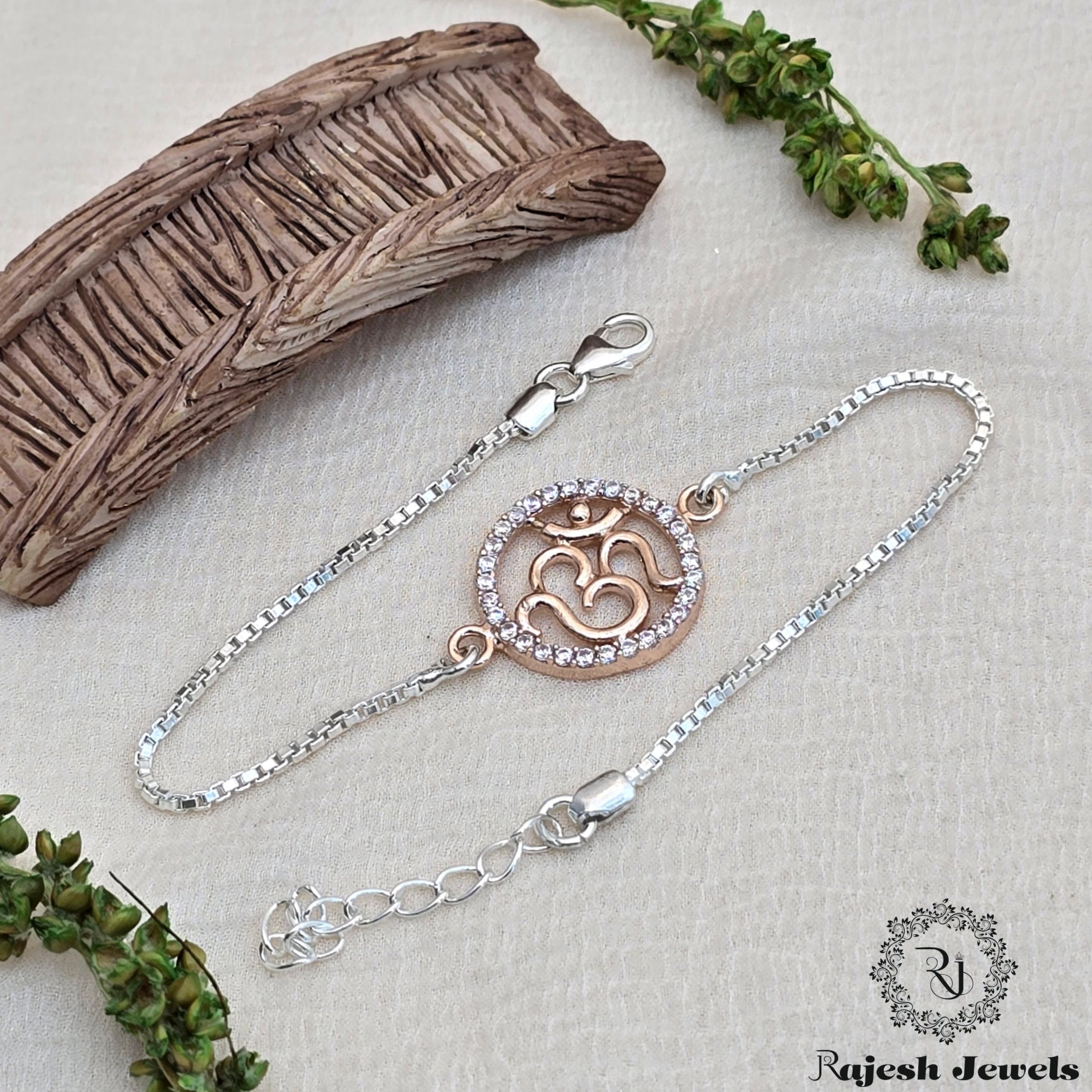 Vibrant Om Silver Rakhi
