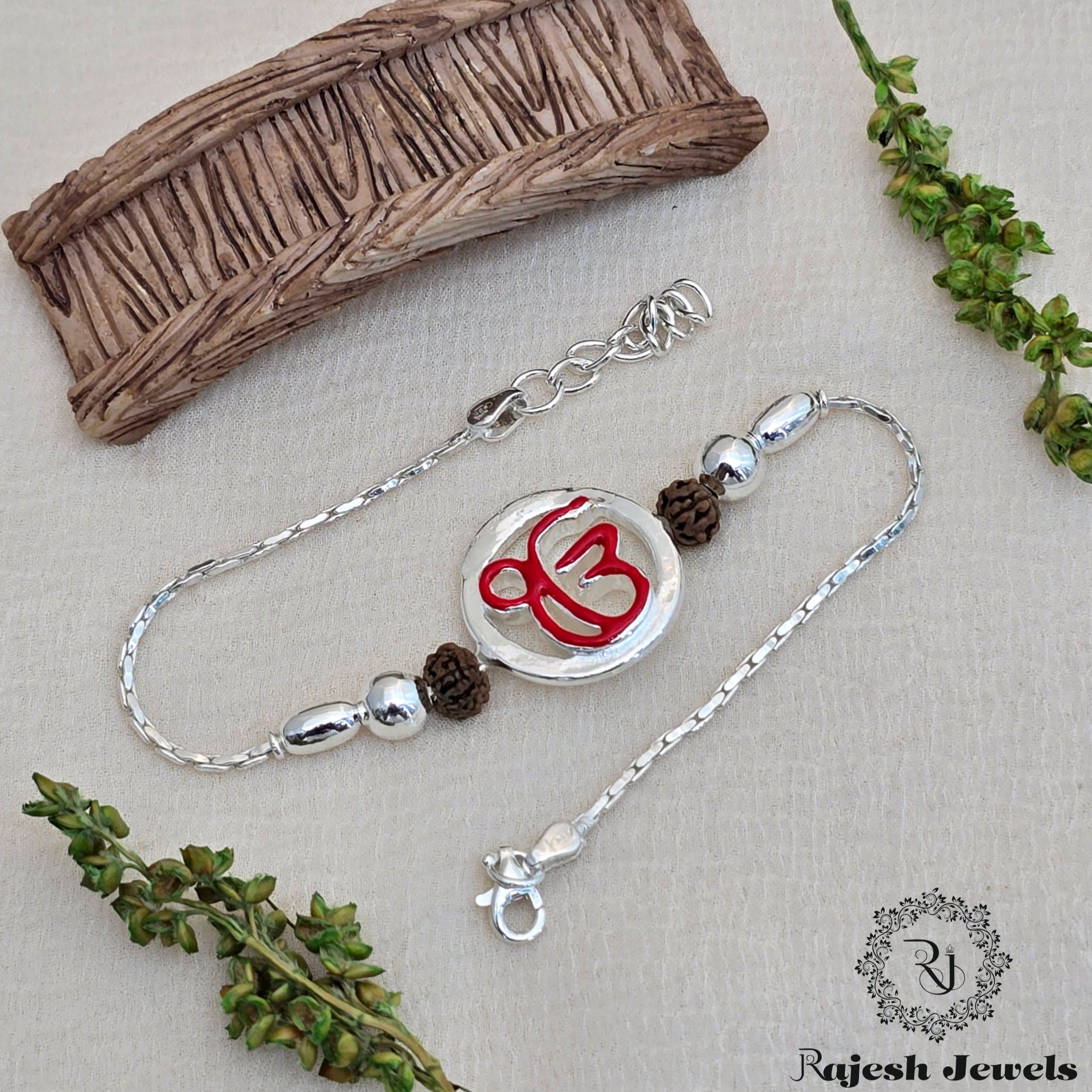 Om Silver Rakhi