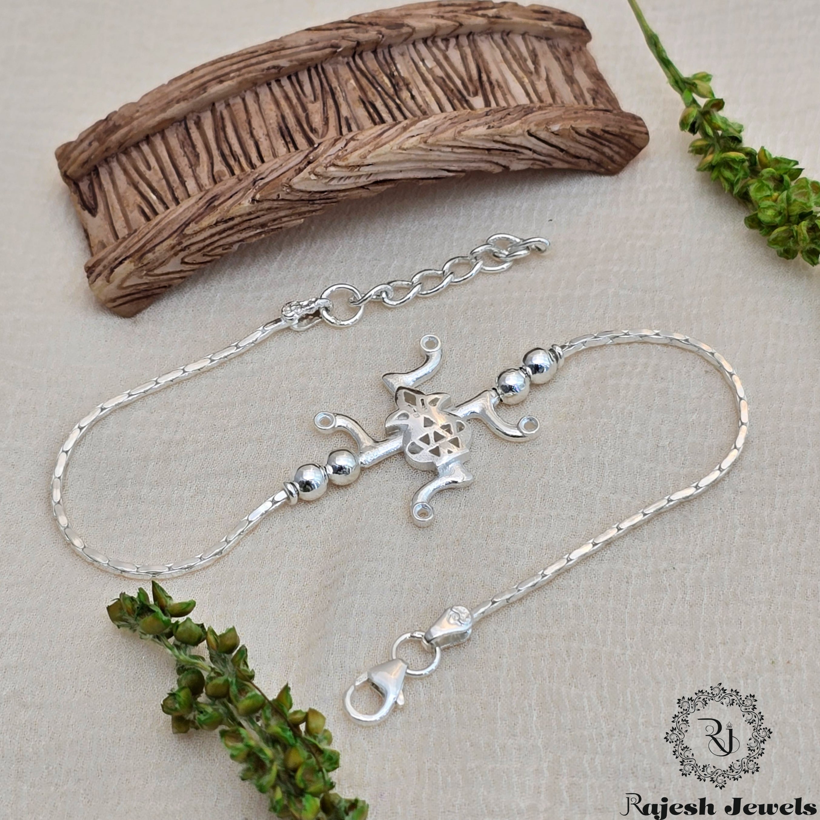 Magal Swastik Silver Rakhi