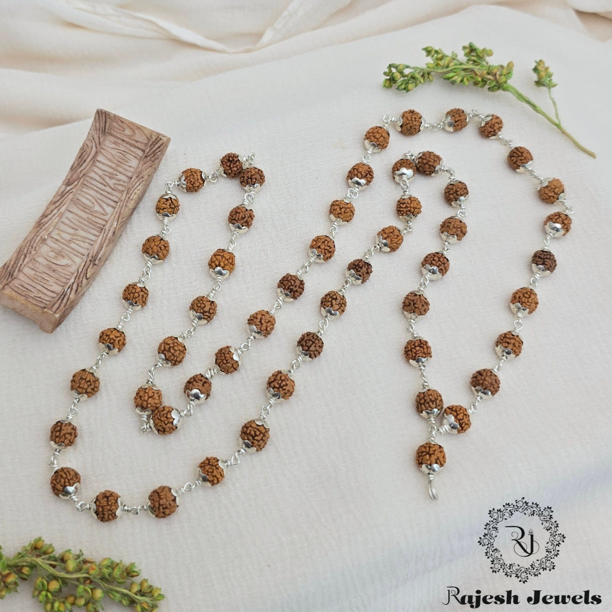 54 Rudraksh Mala With Silver Caps
