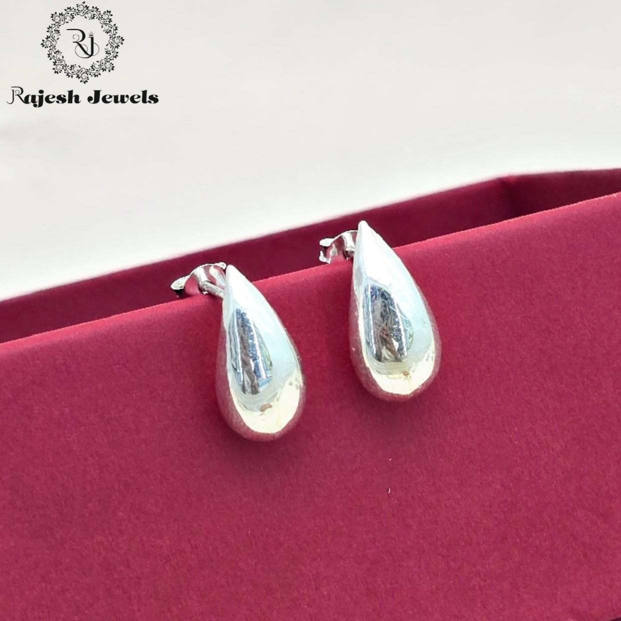 Elegant Silver Teardrop Stud Earrings