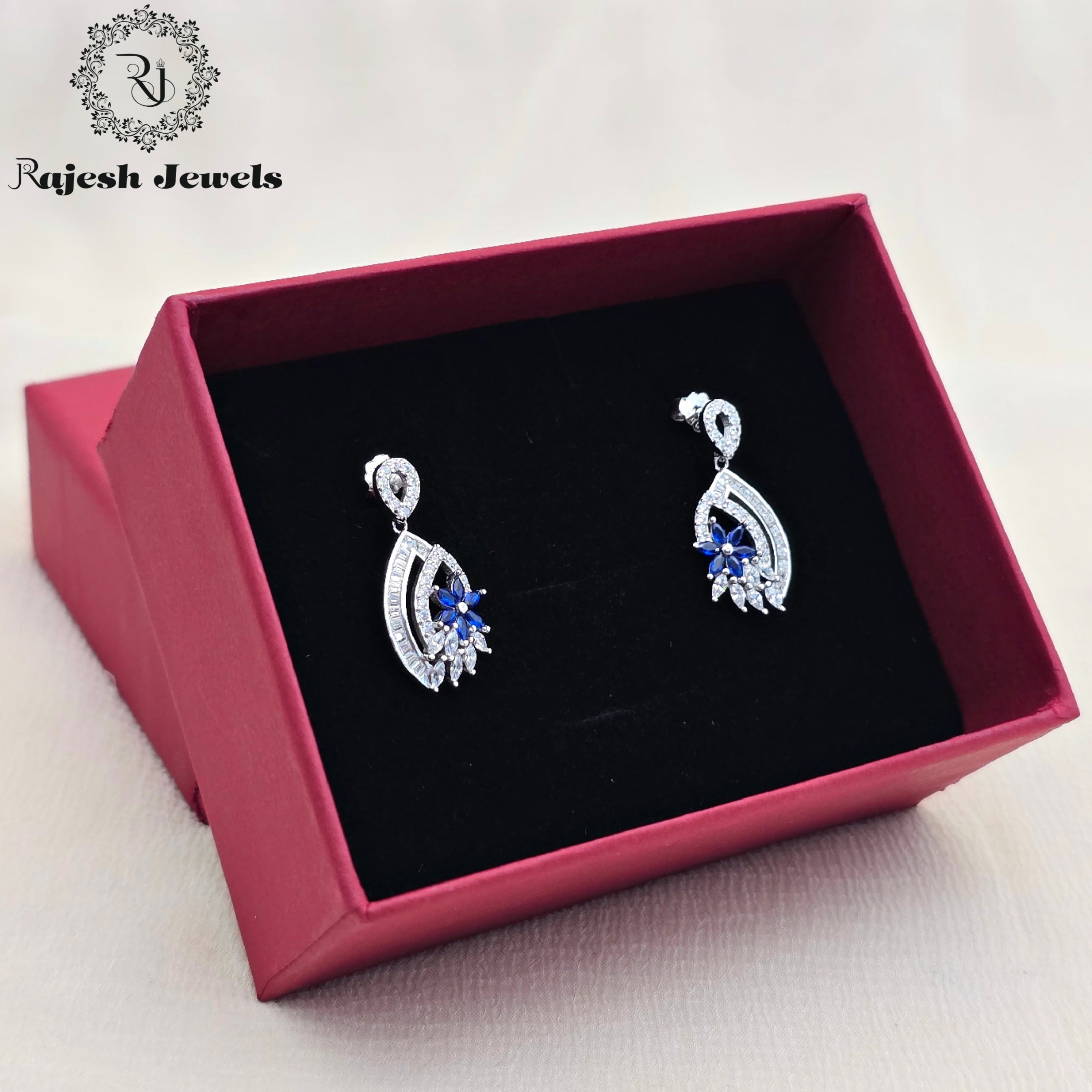 Mesmerizing Blue Cz Hanging Earrings