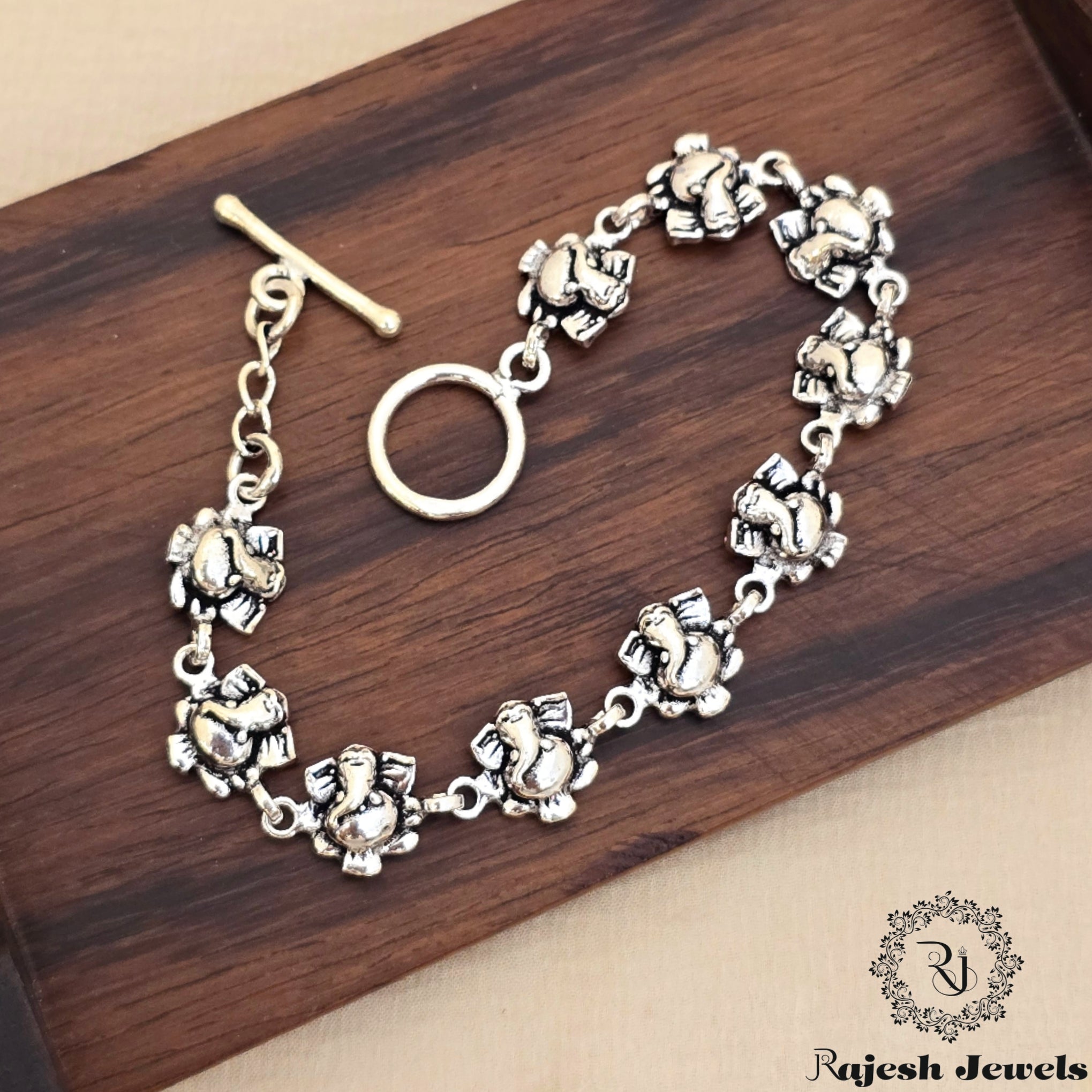 Amazing Ganapati Interlinked Silver Oxidised Ladies Bracelet