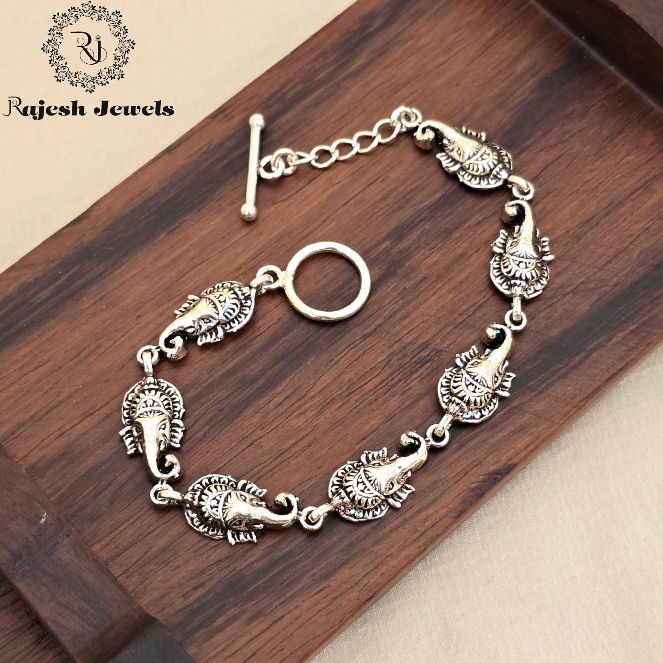 Electrifying Gajanana Silver Ladies Bracelet