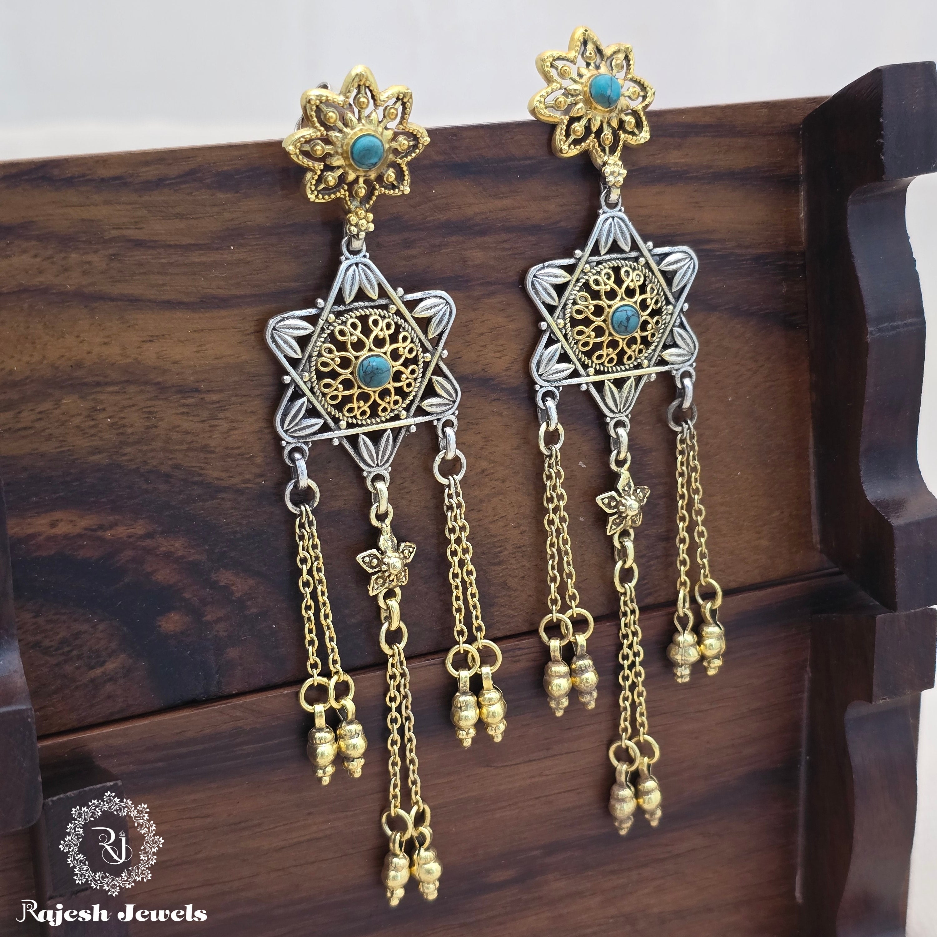 Outstanding Silver Dual Tone Chandbali Earrings