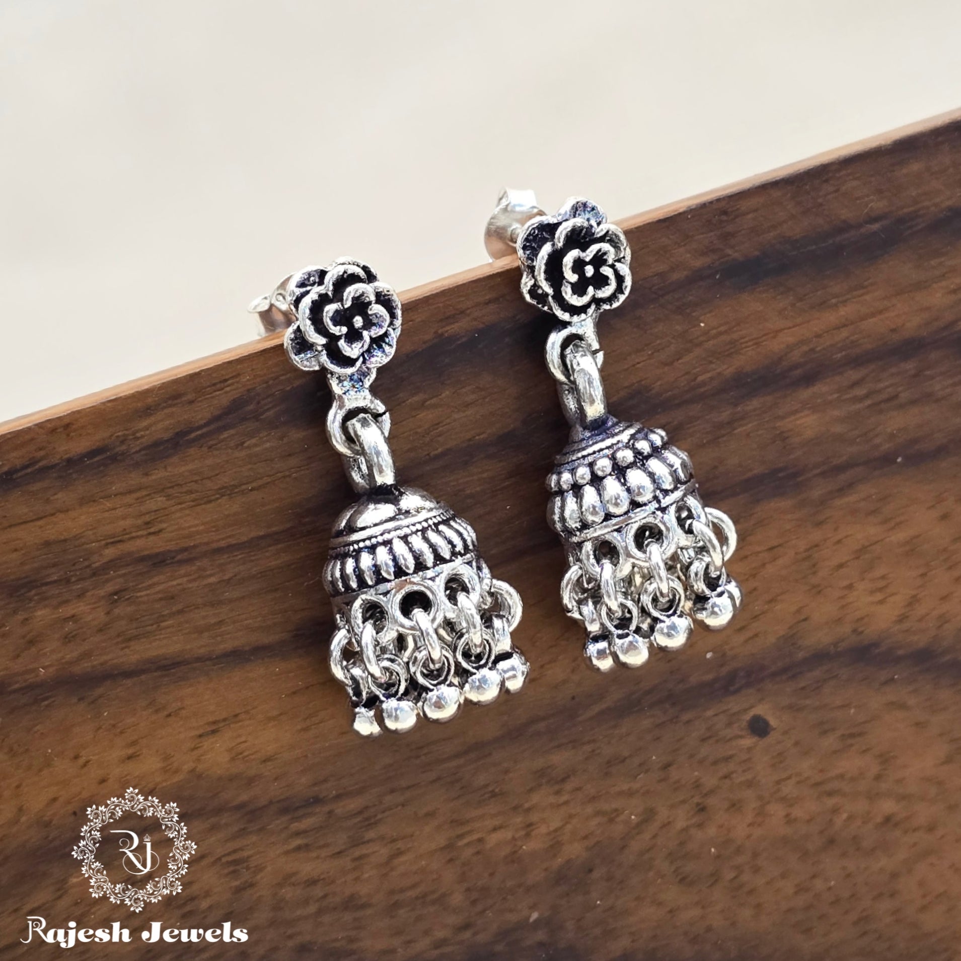 Exceptional Dailywear Silver Jumka Earrings