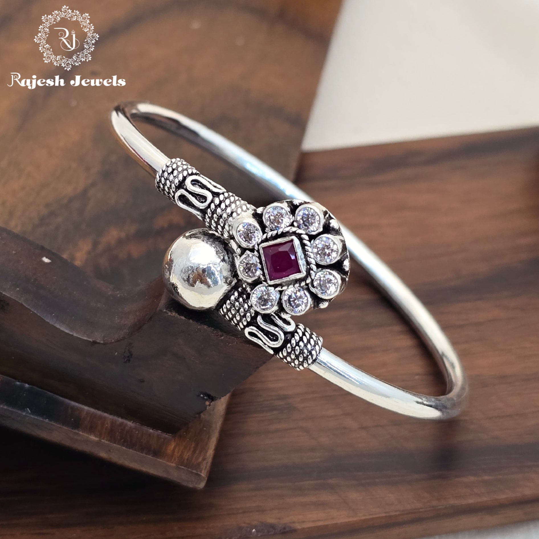 Fascinating Radiant Silver Cutstone Hand Kada