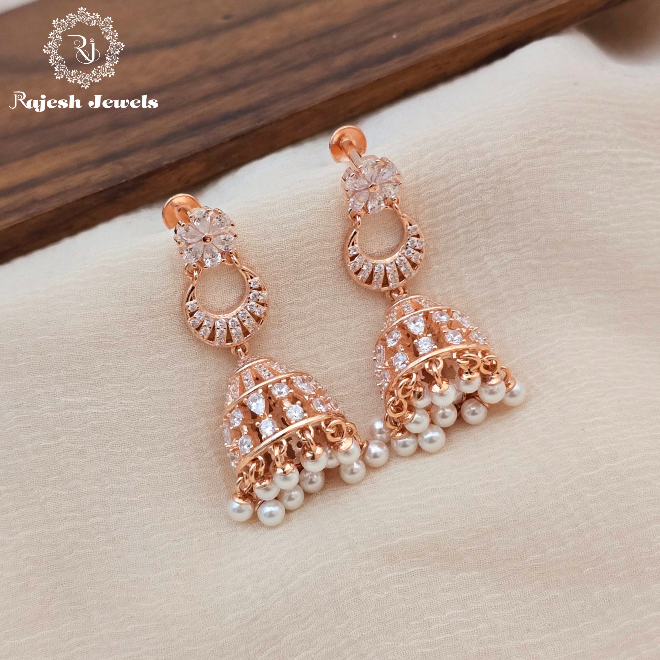 Luxurious Cz Rosegold Jumka Hanging Earrings