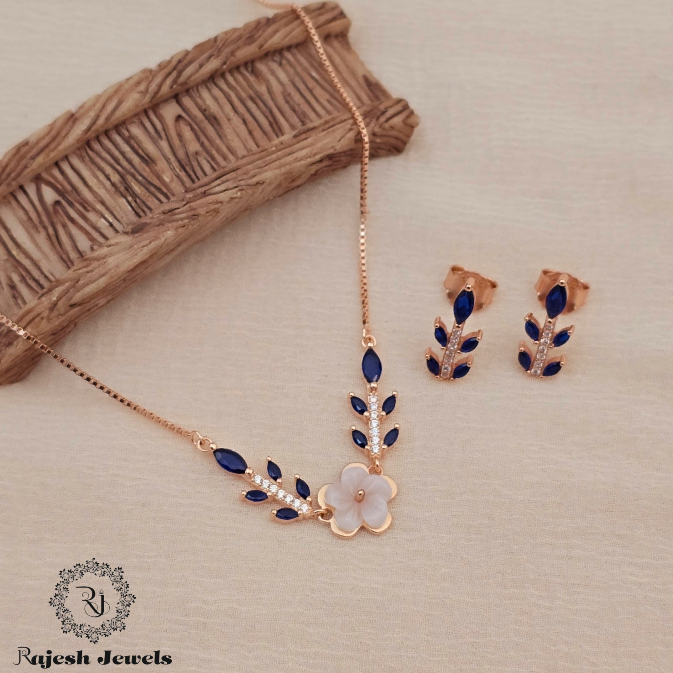 Leafy Flowered Royal Blue Cz Necklace With Earrings