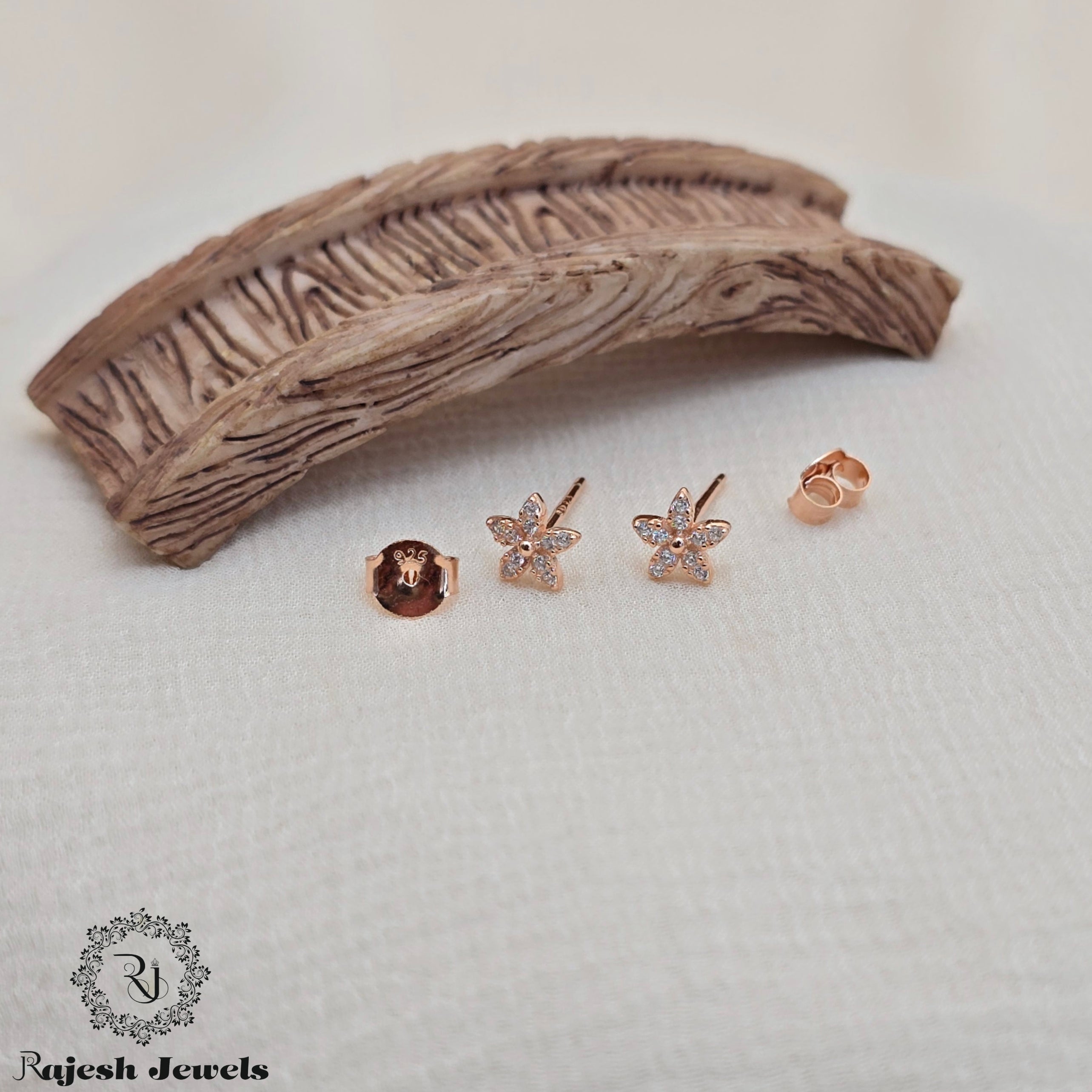 Wonderful Star Design Cz Rosegold Earrings