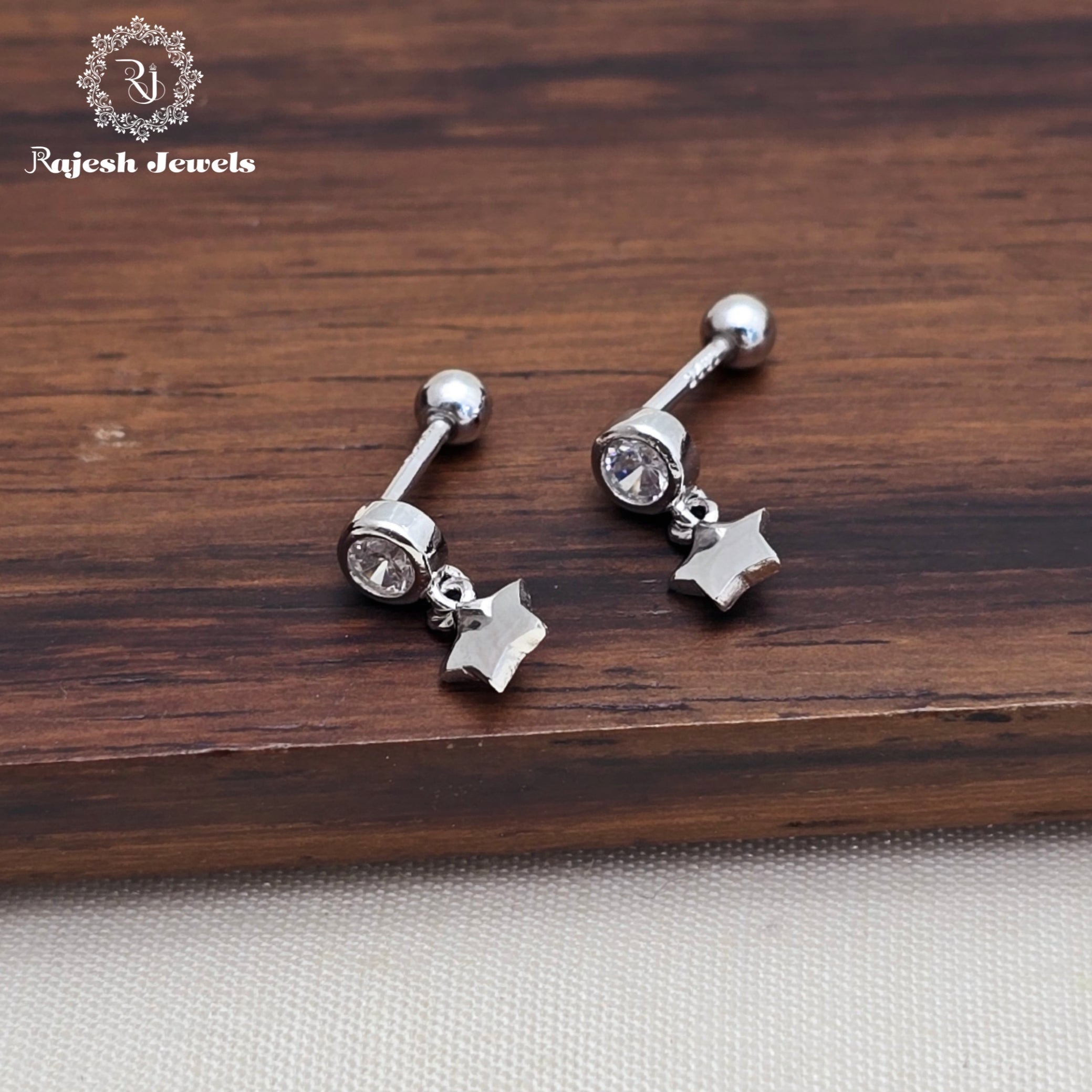 Alluring Rodhium Finish Second Stud Earrings