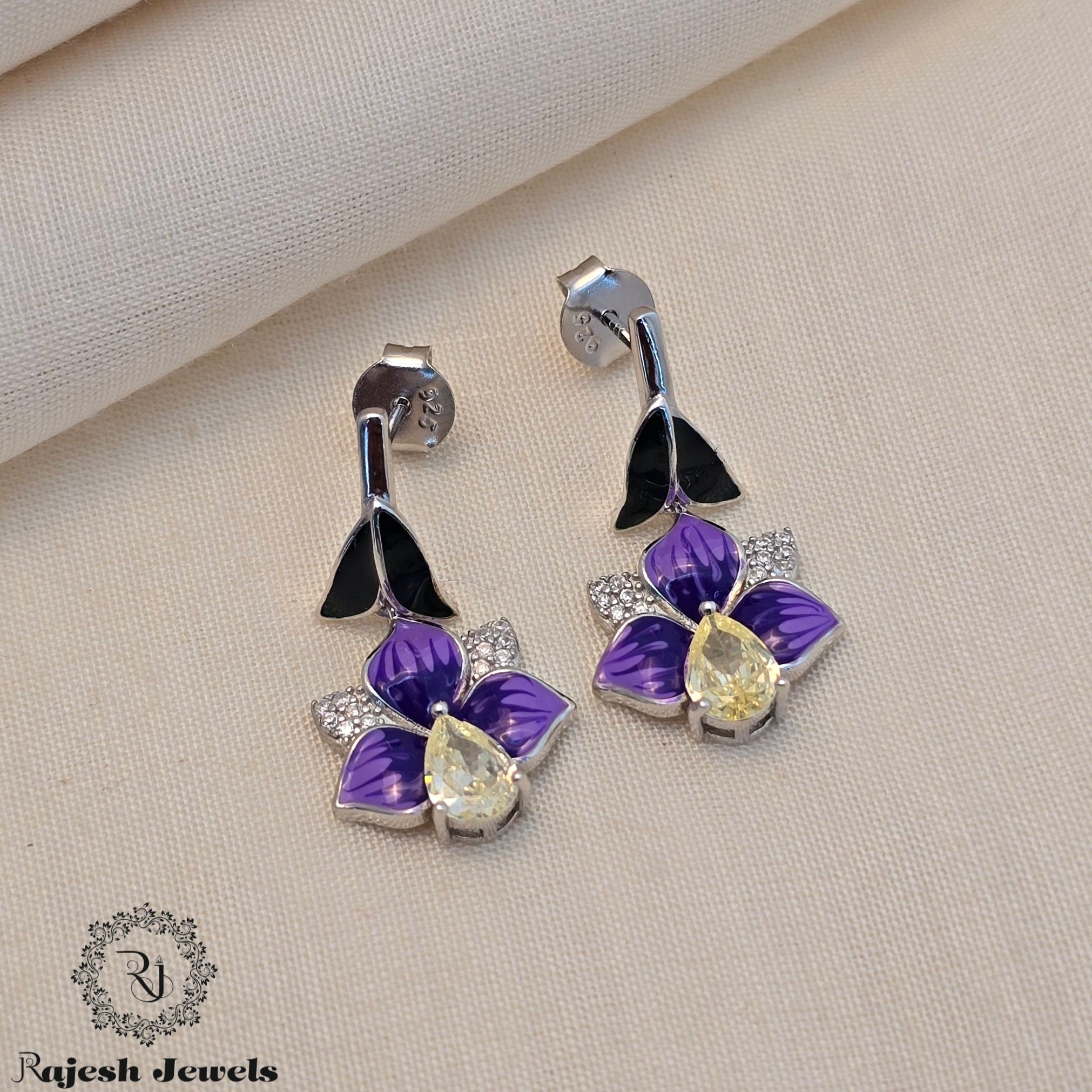 Mesmerizing Rodhium Finish Earrings