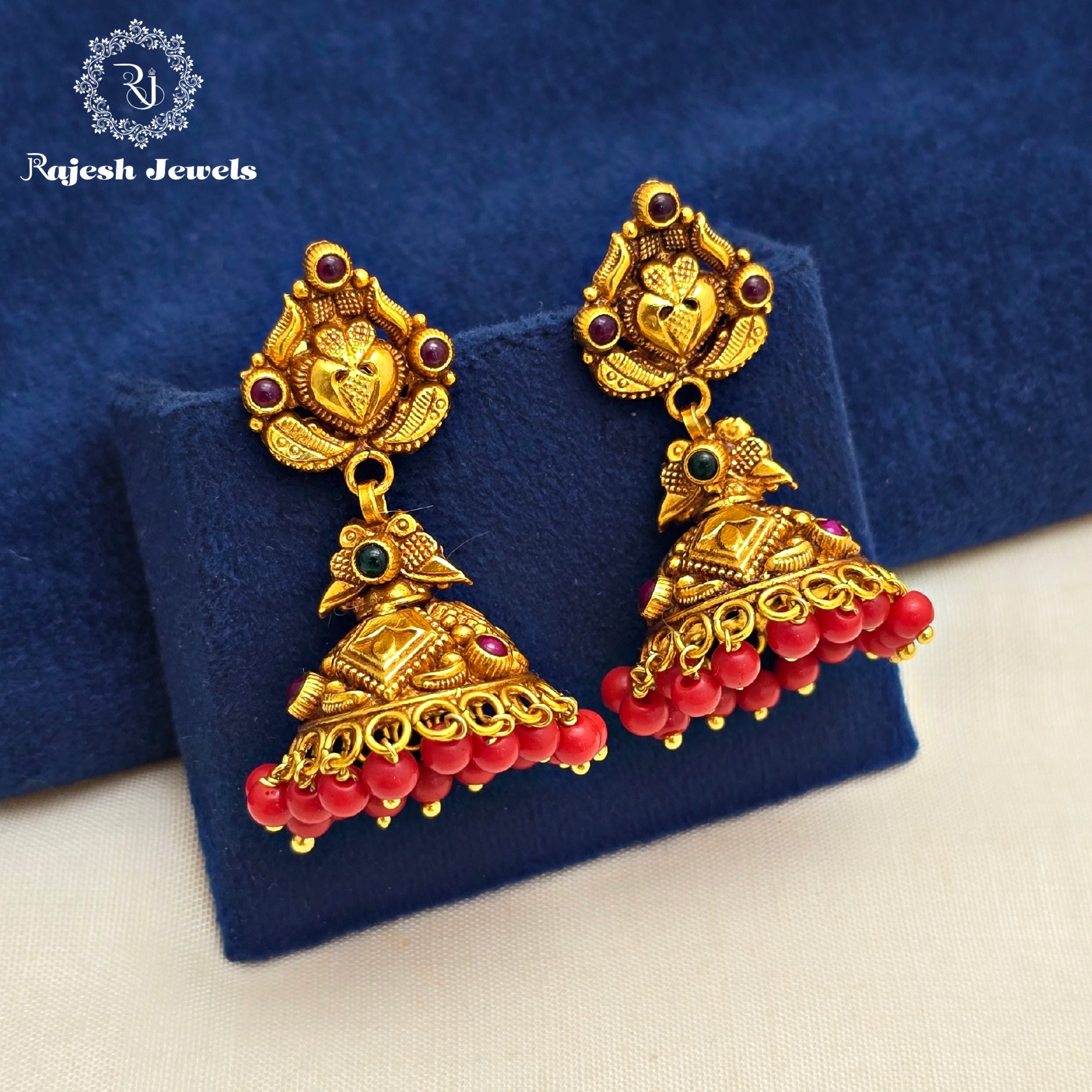Magnificent Coral Jumka Earrings