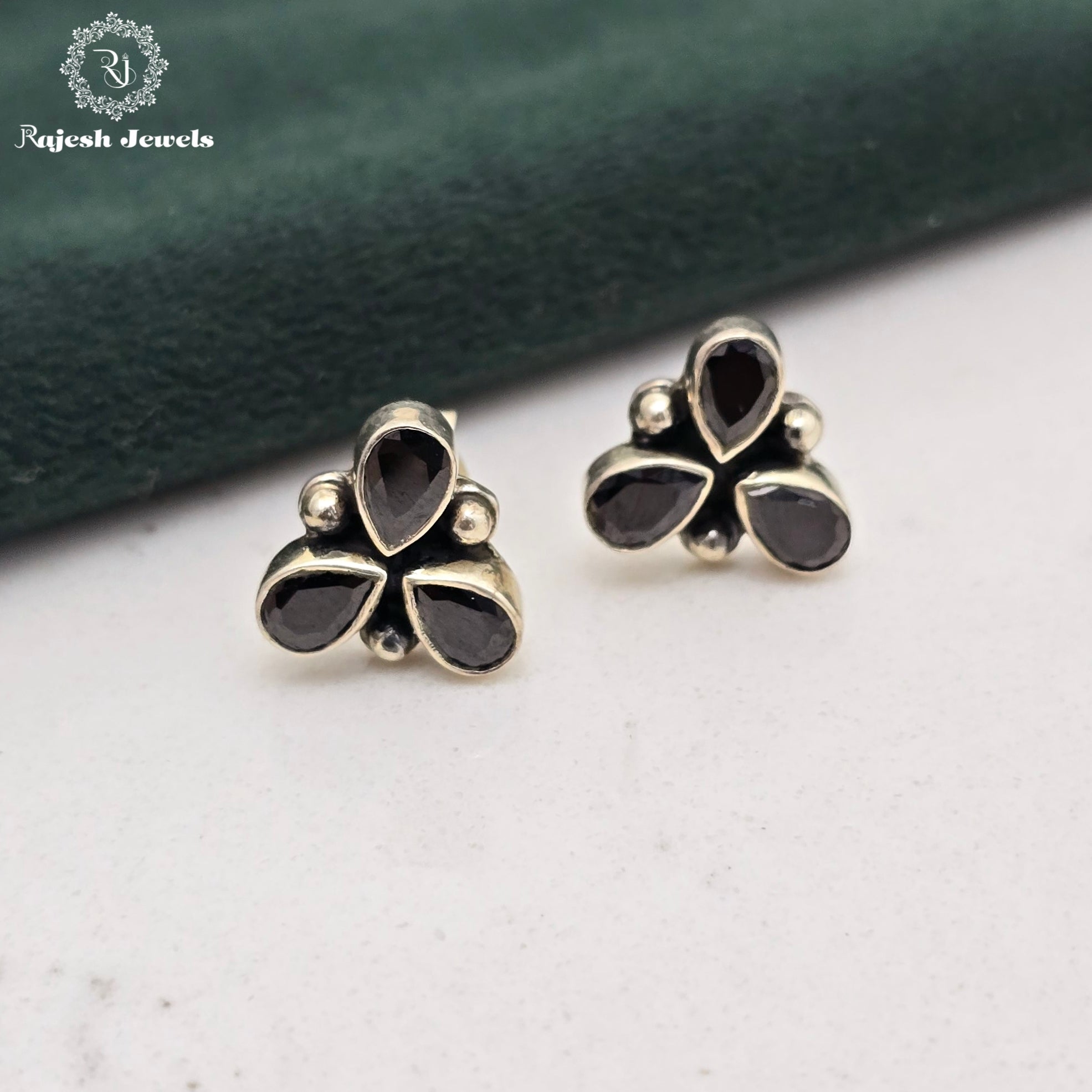 Alluring Black Cutstone Stud Earrings
