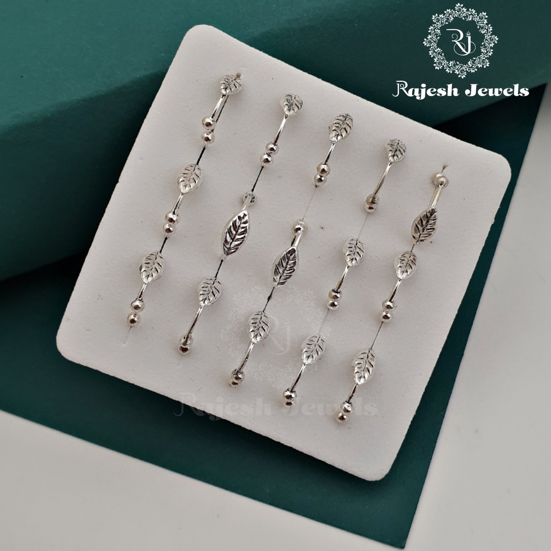 Sleek Leafed Silver Noserings