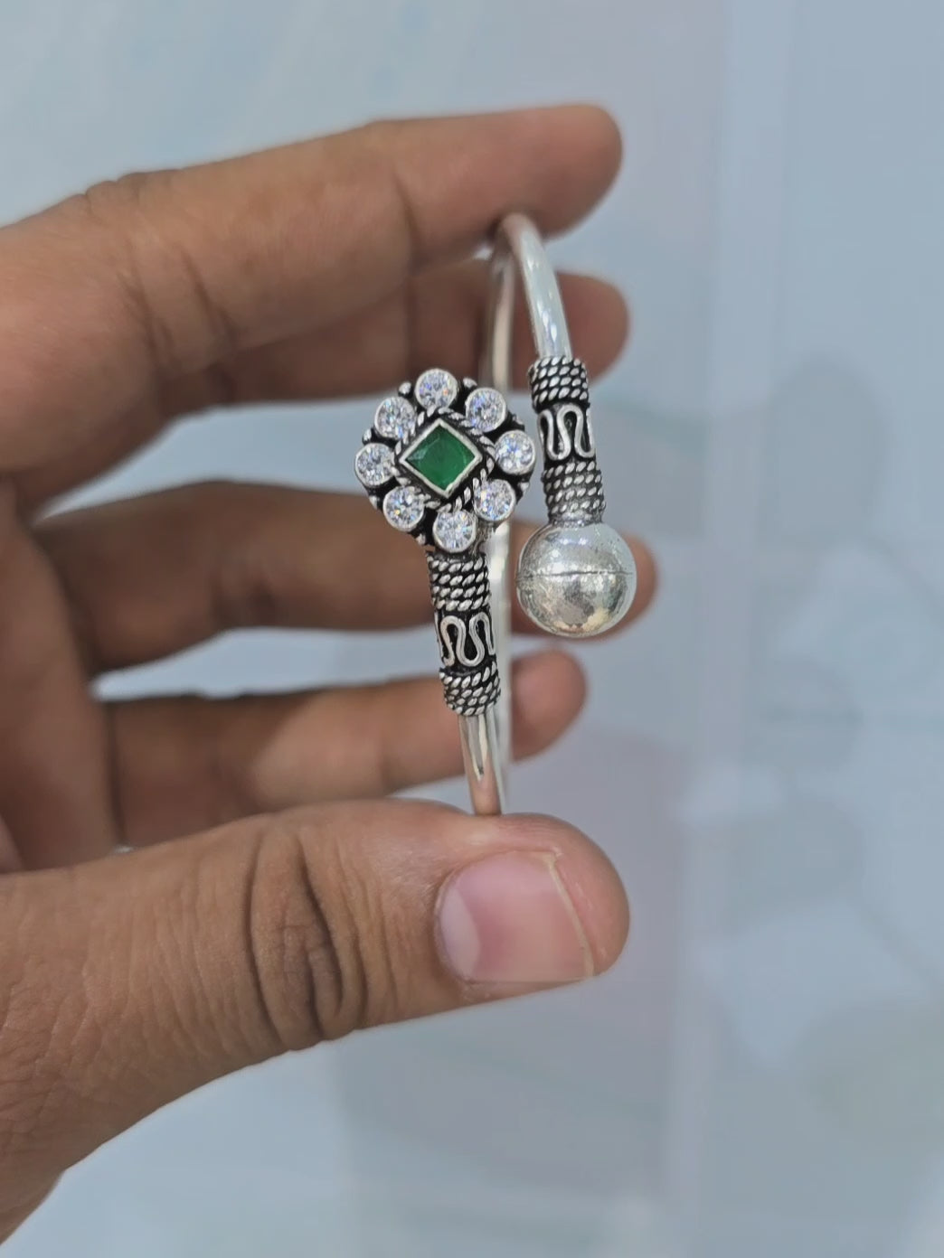 Load video: Interesting Green Squared Silver Hand Kada