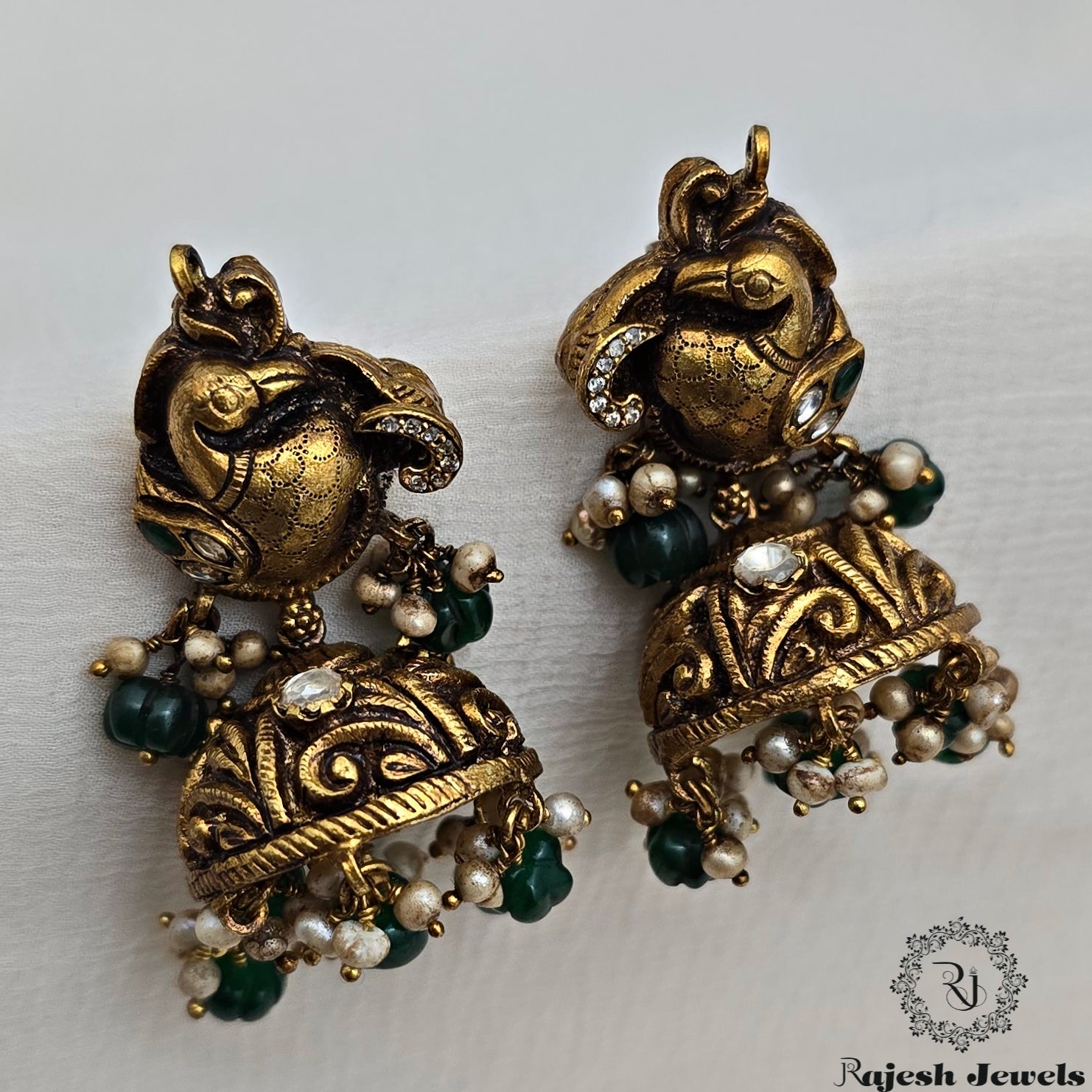 Fabulent Gold Plated Nakshi Moissanite Jumka Earrings