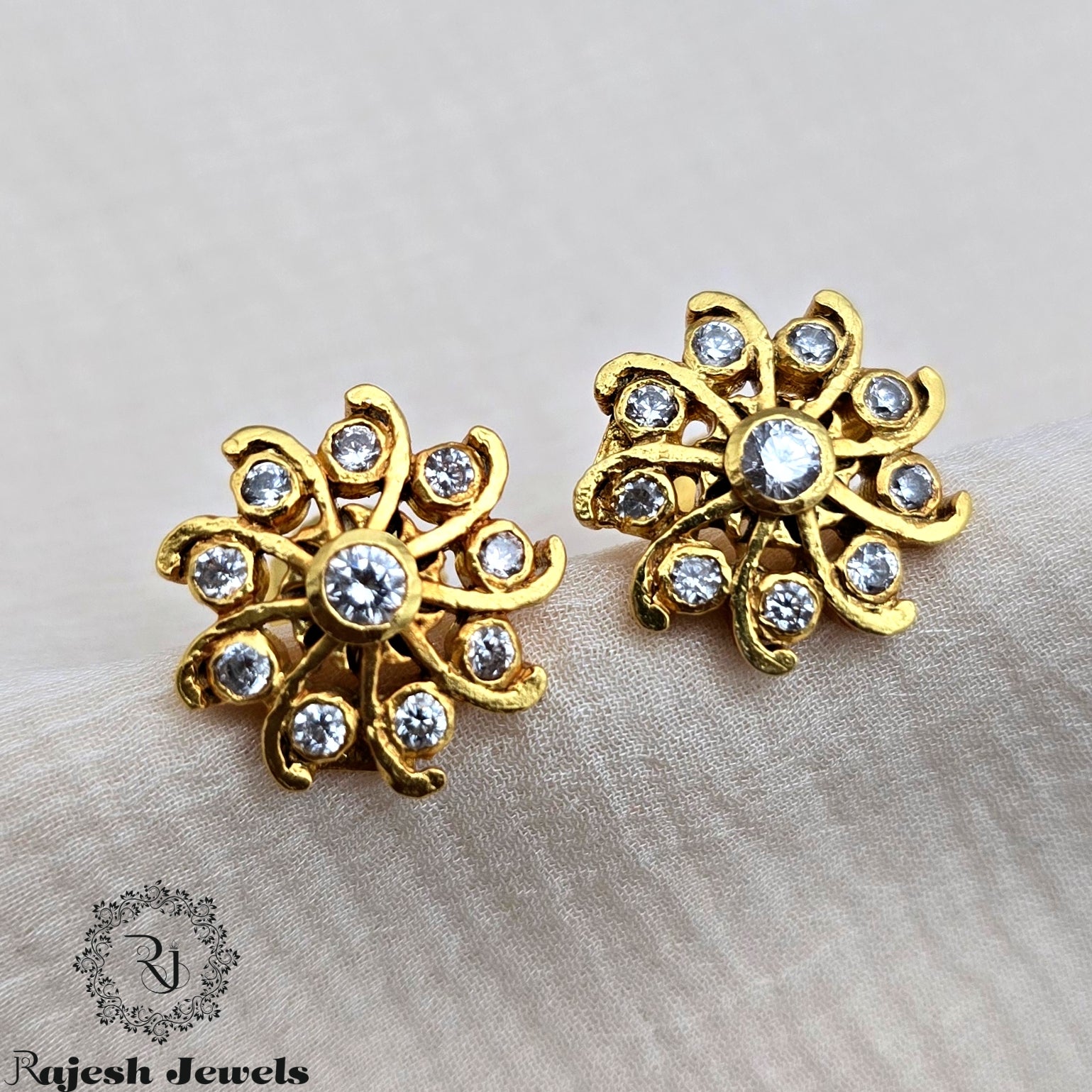 Excellent Swirl Cz Gold Plated Earrings