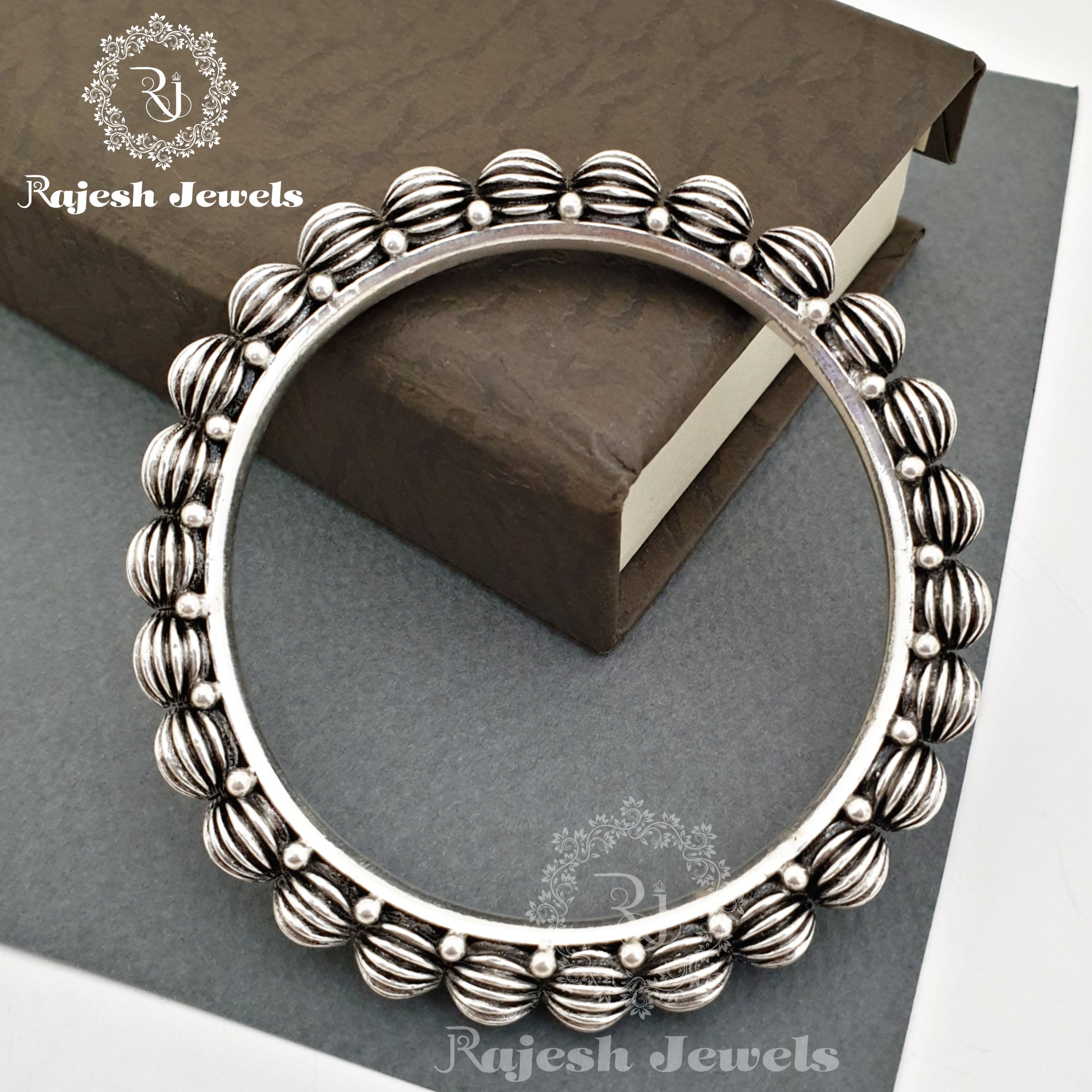 Embellish Silver Bangle