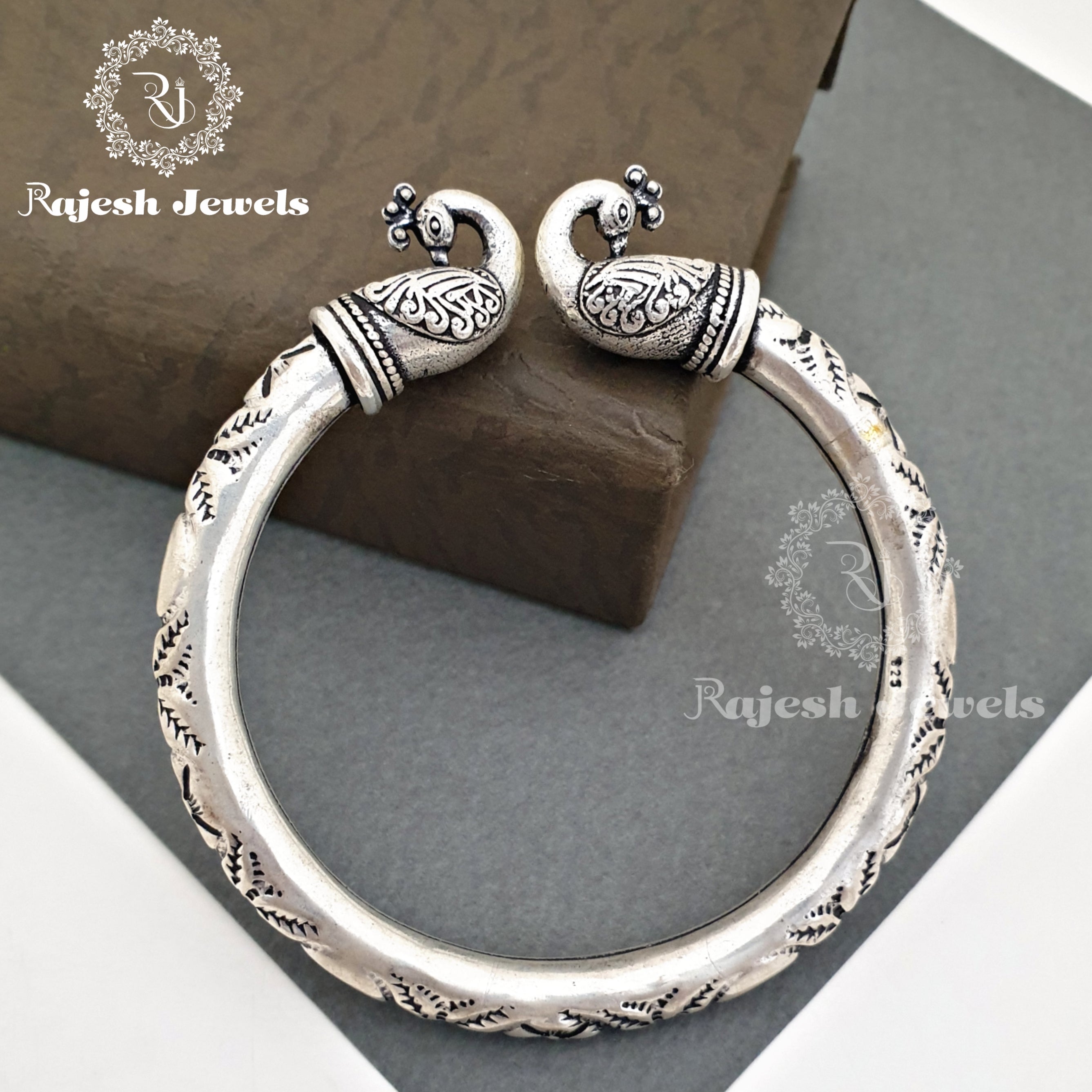 Alluring Nakshi Peacock Silver Kada